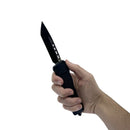 Automatic OTF knife with tanto blade in hand