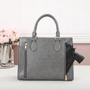 CCW purse in the color gray for women safety.