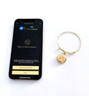 Gold expandable bracelet with phone app