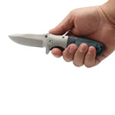 Knife woodgrain premium blue handle open in hand
