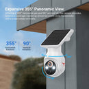 Solar-powered security camera with 355° horizontal and 90° vertical rotation on a building exterior.