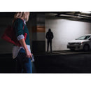 Taser pulse held by a woman