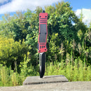 Automatic OTF knife red and black profile view