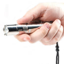 Guard Dog Security spectra tactical flashlight held in hand