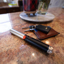 Pepper ball compact single shot keys and wallet