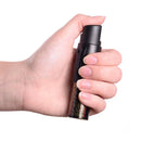 Sabre 3 in 1 pepper spray with clip in hand