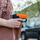 Sabre aim and fire pepper gel with trigger in hand of a woman