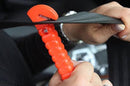 Seat belt cutter in use