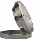 Surveillance DVR spy clock includes secret hidden camera inside with motion detector shown with base.