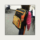 Streetwise Orange Emoji Bulletproof Backpack Modeled