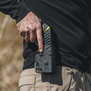 Taser pulse gun holstered