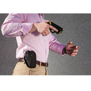 Taser Pulse holster with snap shown worn taser in hand