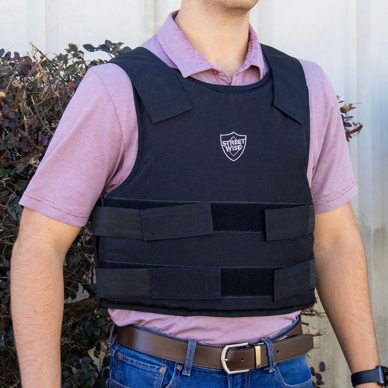 Ballistic vest modeled and shown worn for personal protection.