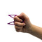 The Cat self defense keychain shown using a model how to hold and use for personal safety.