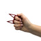 The Cat self defense keychain shown by a modlel how to use for safety protection.