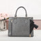 CCW purse in the color gray for women safety.