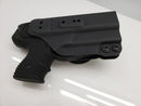 Black JPX pepper gun holster on a white surface