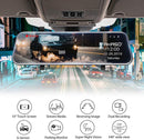 Car dashboard with a rearview mirror displaying dash camera.