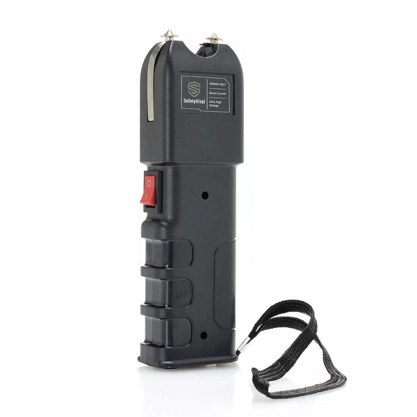 Black stun gun with a safety lanyard.