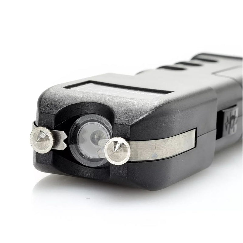 Black stun gun with bright flashlight and safety lanyard.
