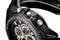 Black wristwatch with built-in disguised spy hidden camera operating buttons.