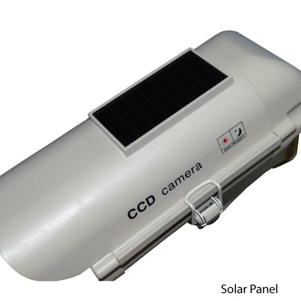 Dummy surveillance camera with solar powered light.  Solar panel shown.