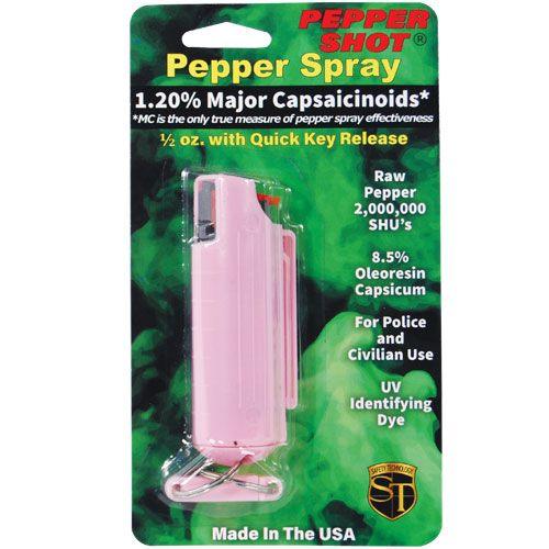 Pink hardcase pepper spray with packaging.