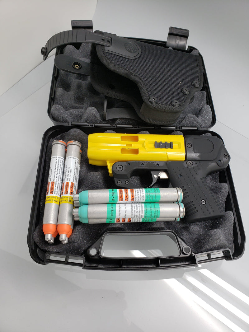 The FIRESTORM JPX 4 compact shot pepper gun with  yellow barrel, holster and carry case.