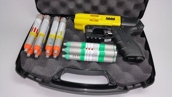 The FIRESTORM JPX 4 shot LE defender yellow barrel pepper gun bundle package.