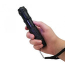 Jolt black rhinestun stun gun shown in hand. Easy to use for self-defense.