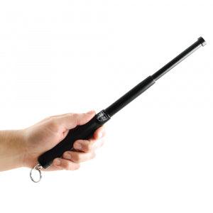 Baton shown in hand for self-defense.