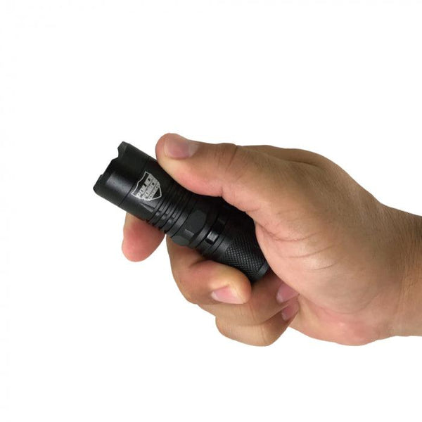 This tactical LED flashlight is a little over three inches long and fits nicely in your hand.