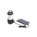 Rechargeable LED Camping Lamp with Power Bank Provides 360 degrees of bright light. Shown with powerbank charging.
