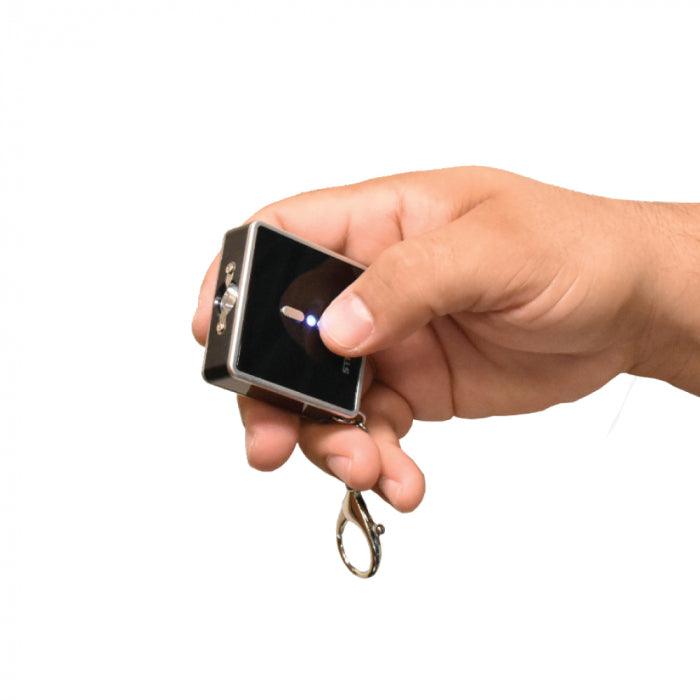 Square off stun gun. Easy to use and fits on keychains for your self-defense.