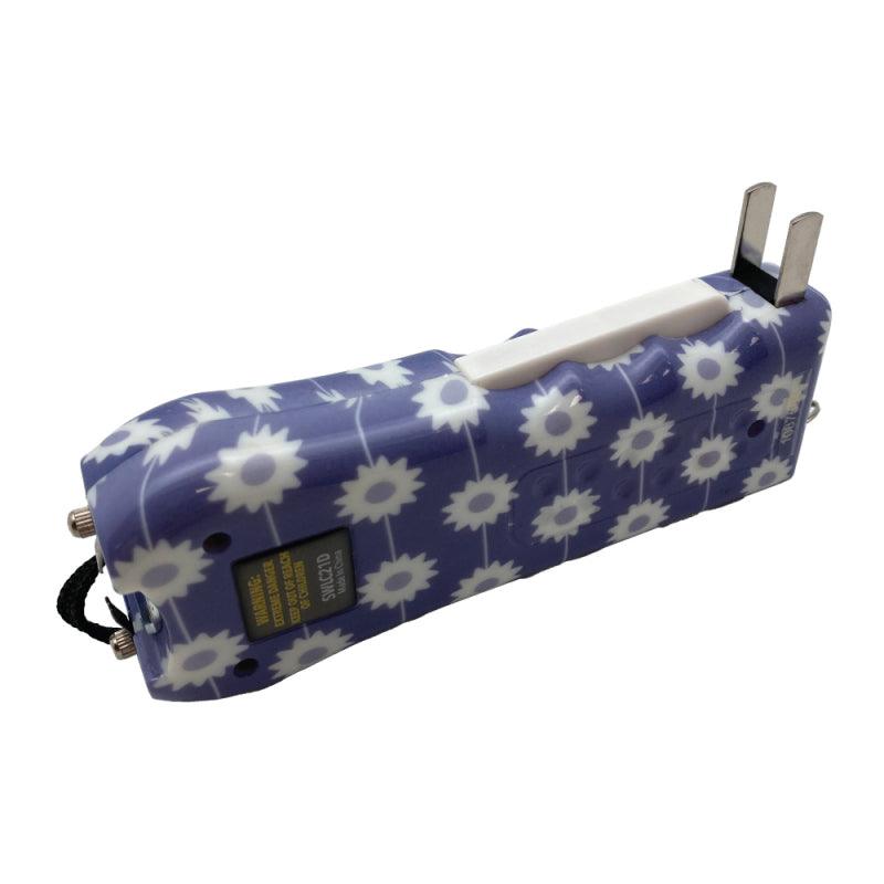 Streetwise Ladies Choice stun gun with purple color daisy design for women shows the squeeze lever to activate.