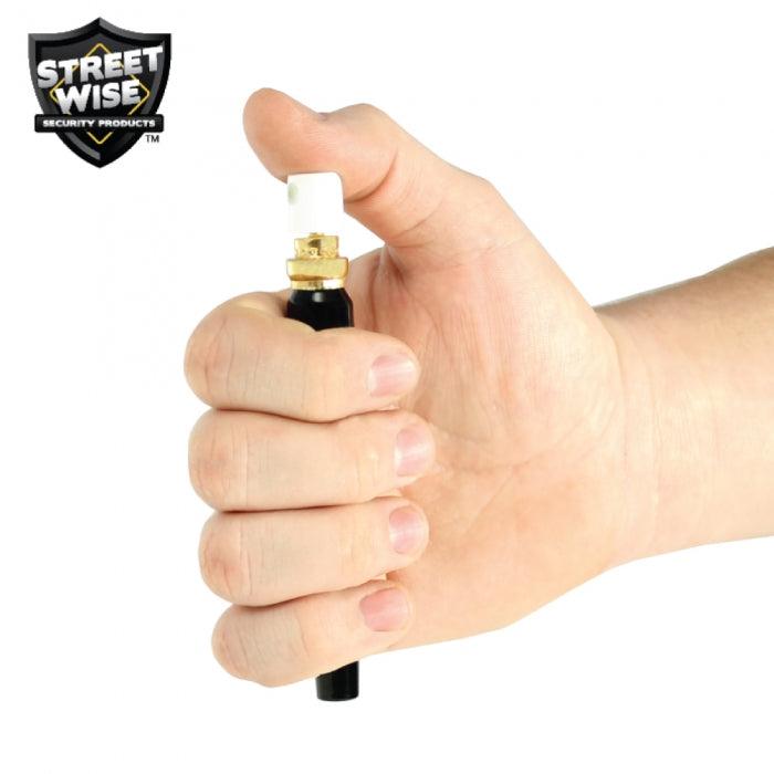 Pepper pen spray displayed on how to use for personal protection.